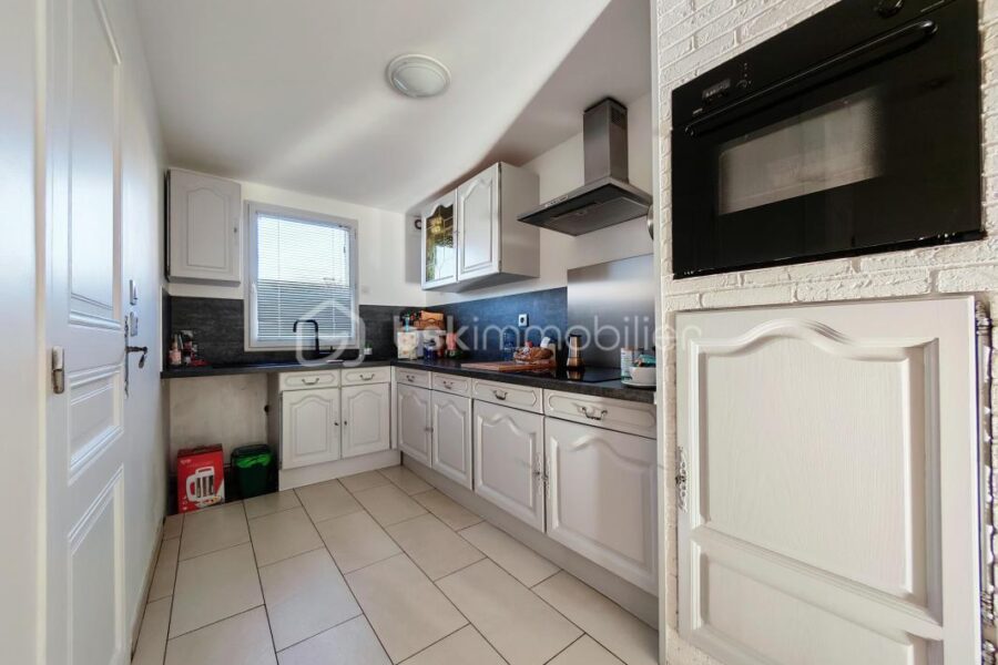 Maison à vendre à Emmerin — Vue parc & jardin — photo 8
